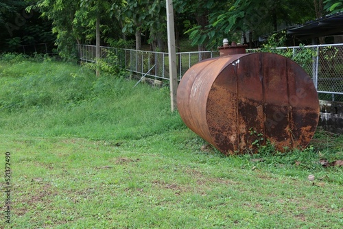 old wooden barrels in the forest