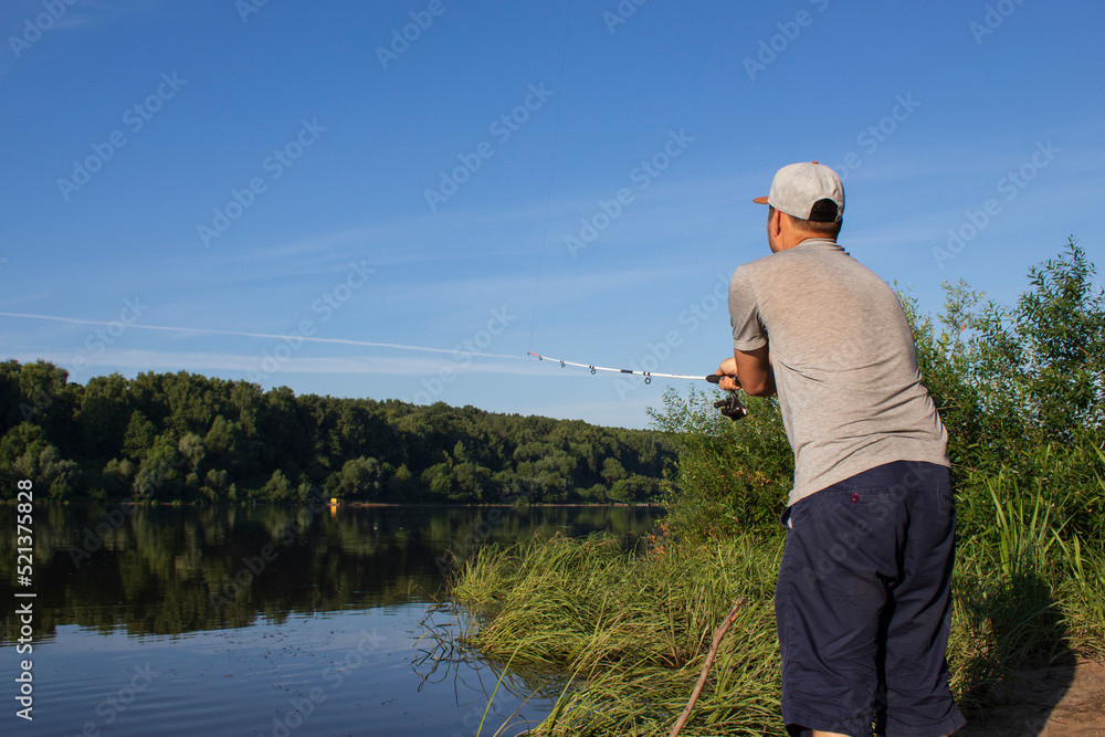 man fishing on the lake man fishing on the lake