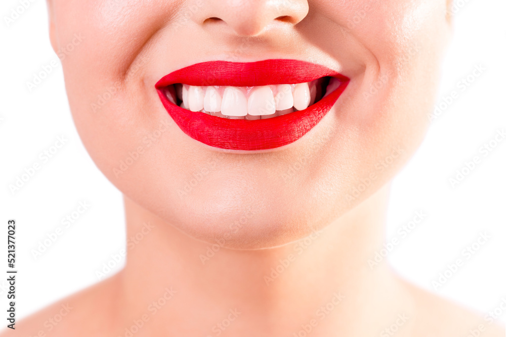 Close up portrait of beautiful wide smile with whitening teeth and perfect red lips of young fresh woman isolated over white background, dental care Close up portrait of beautiful wide smile with whitening teeth and perfect red lips of young fresh woman isolated over white background, dental care