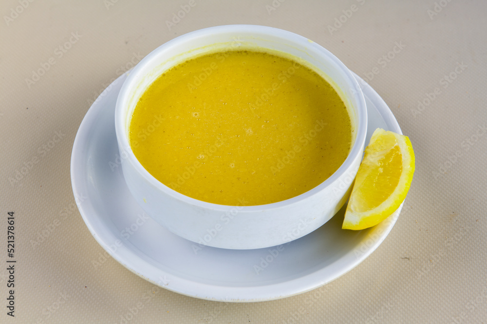 Lentil ( mercimek ) soup with melted butter and red pepper sauce Lentil ( mercimek ) soup with melted butter and red pepper sauce