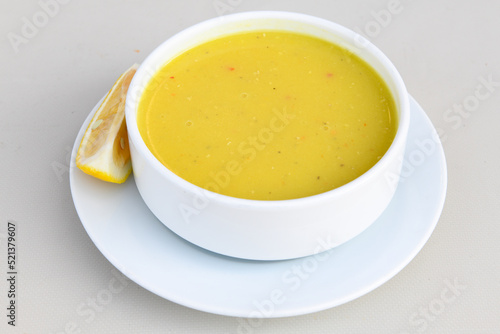 Lentil ( mercimek ) soup with melted butter and red pepper sauce