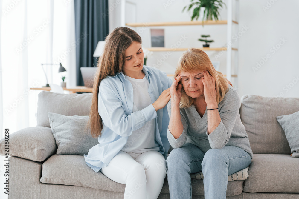 Talking about troubles. Mother and daughter is together at home Talking about troubles. Mother and daughter is together at home