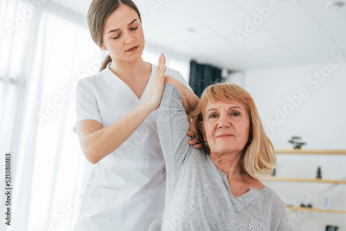 Senior woman is visiting physician in the office