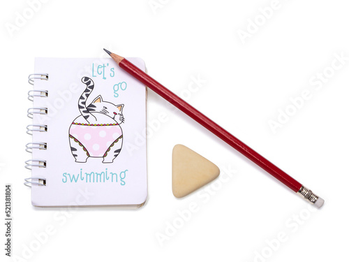 Small spiral notebook with a picture of a cat and burgundy pencil and eraser. Isolated on white background.