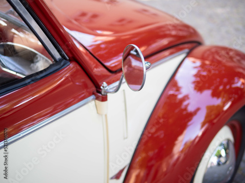The old-timer car  in sunlight.