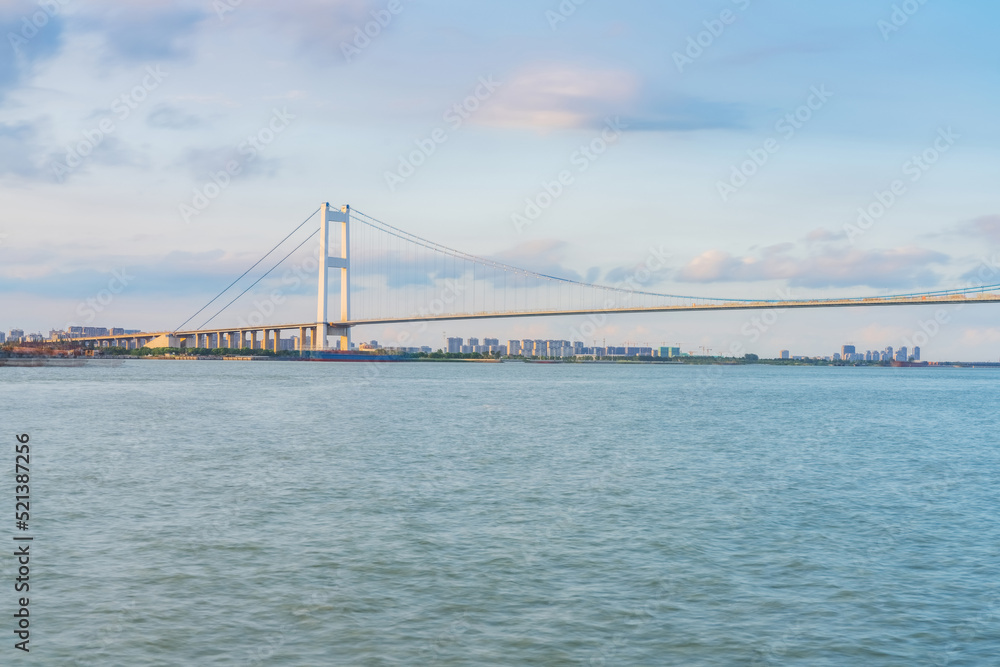 Jiangyin Yangtze River Bridge and cargo ships and Yangtze River scenery in Jiangyin, China