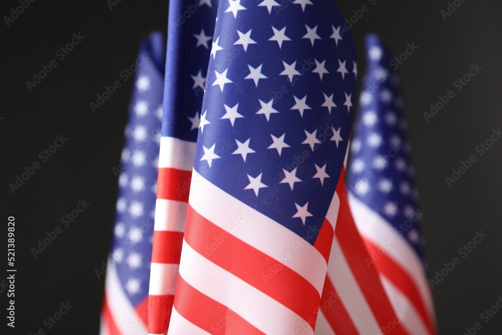 National flags of America on black background. Memorial day celebration