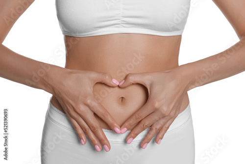 Wallpaper Mural Woman in underwear making heart with hands on her belly near white background, closeup. Healthy stomach Torontodigital.ca