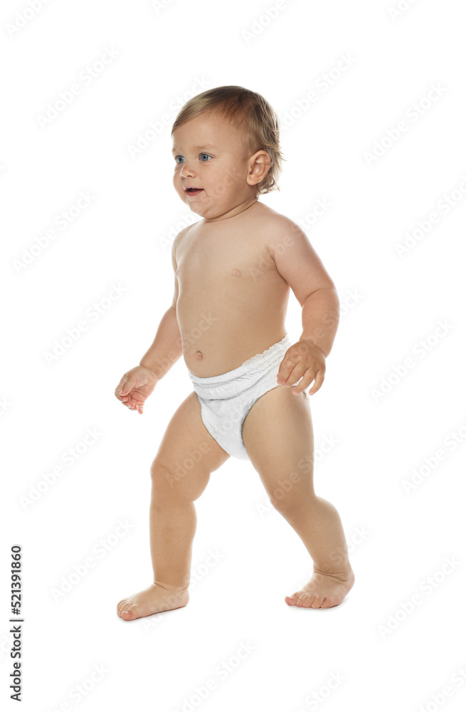 Cute baby in diaper learning to walk on white background Cute baby in diaper learning to walk on white background