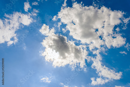 White fluffy clouds in the blue sky background.Cloudy white blue sky in the nice blue heaven sky.
