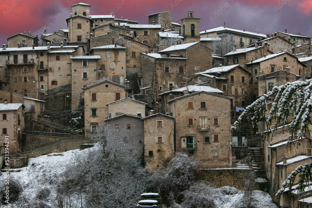 View of Scanno medieval little town with snow during winter sunset in Abruzzo Italy