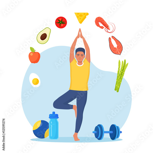 Diet plan. Man doing  exercise and planning diet with fruit and vegetable. Guy doing yoga. Dietary eating, meal planning, nutrition consultation, healthy food, sport. Health lifestyle, fitness