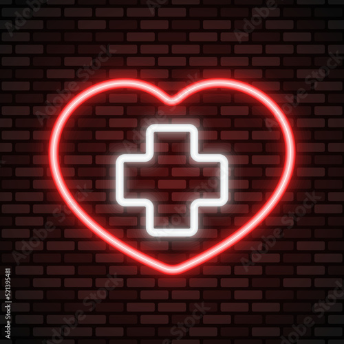 Medicine neon icon. Red neon heart with white cross on black brick wall background. Best for polygraphy, mobile apps and web design.