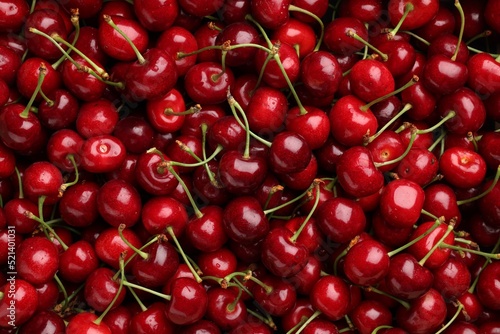 Valokuvatapetti Ripe sweet cherries as background, top view