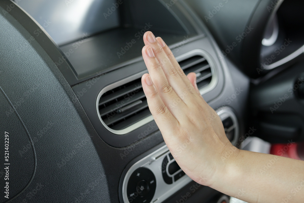 hand checking air conditioner system inside the car hand checking air conditioner system inside the car