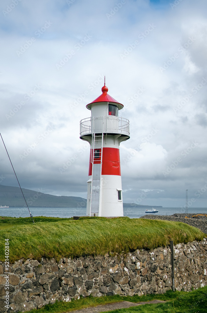 Lighthouse of Torshavn inside fort of Torshavn. Skansin fortress of Torshavn and its lighthouse in Faroese island of Streymoy. Atlantic Ocean 