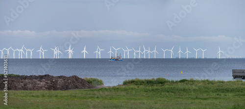Billede på lærred wherry sailing in front of offshore wind farm on Oresund, from Dragor, Denmark