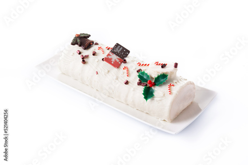 White chocolate yule log cake isolated on white background