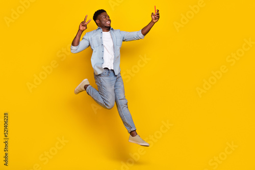 Full length photo of blogger jump up make selfie gadget show v sign isolated shine color background