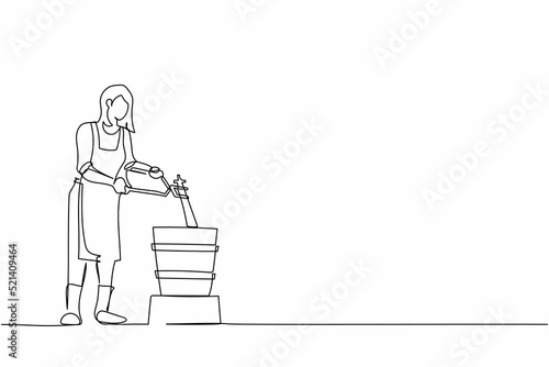 Single continuous line drawing cute female blacksmith master in apron putting hot metal material from furnace in cold water. Steel craft anvil worker. One line draw graphic design vector illustration
