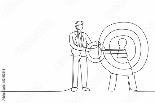 Single continuous line drawing businessman putting big key into bullseye target. Unlock business success. Career or goal achievement. Secret for success in work. One line design vector illustration
