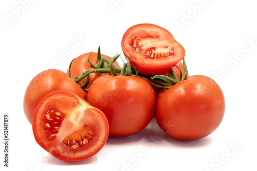 Bunch tomatoes. Freshly cut tomatoes isolated on white background. Organic food. close up
