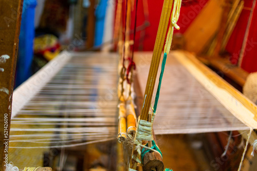 Chefchaouen, Morocco - 18 January 2022 : Traditional Moroccan Berber loom in a coton shop