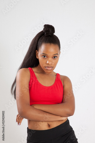 Thoughtful woman with her arms crossed