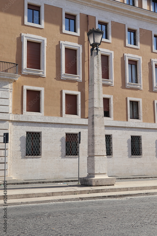 Via della Conciliazione Street View with Building Facade and Stone Lamp Post in Rome, Italy