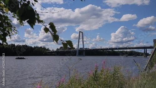 The Kolback Bridge (Kolbacksbron) and Ume river, in Umea city, Sweden photo