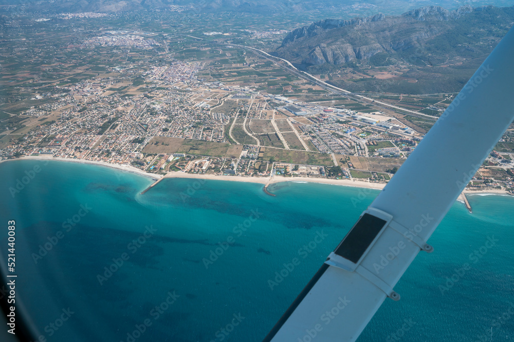 Flying over a coast of mediterranean sea Spain Valencia. 