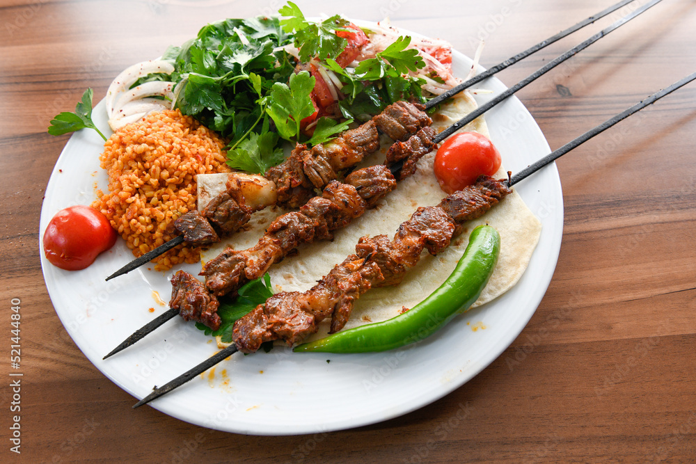 Chicken wings barbeque in a dish with BBQ grill sauce . Izgara tavuk kelebek sis kanat. Tavuk sis, gogus. Chicken wings barbeque in a dish with BBQ grill sauce . Izgara tavuk kelebek sis kanat. Tavuk sis, gogus.