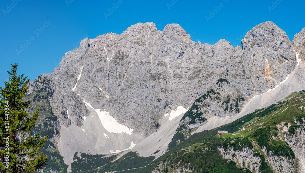 Tirol Mountain Chain with a small shed place on the rocks