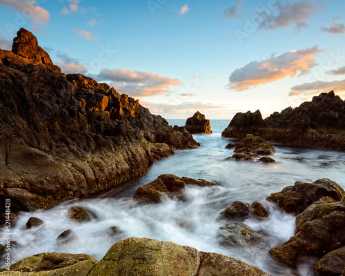 Waves at rugged coastline in Madeira