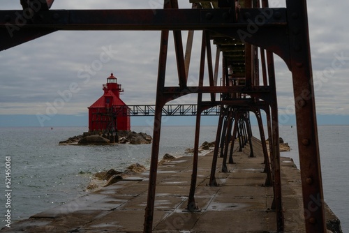 Bay Canal North Pierhead Light against a sea background photo