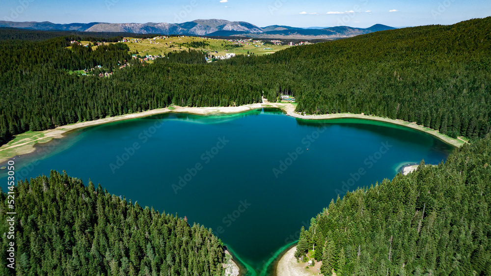 blakc lake in shape of stingray in zabliak, montenegro blakc lake in shape of stingray in zabliak, montenegro