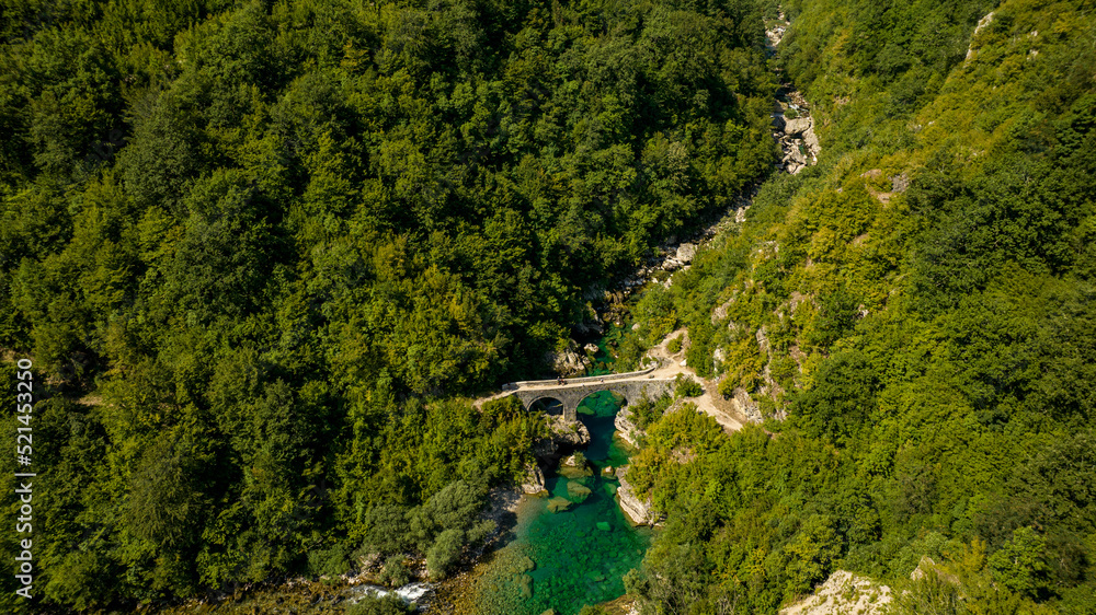 Fototapeta premium aerial view Danilov Most stone Bridge with clear blue water Mrtvica River