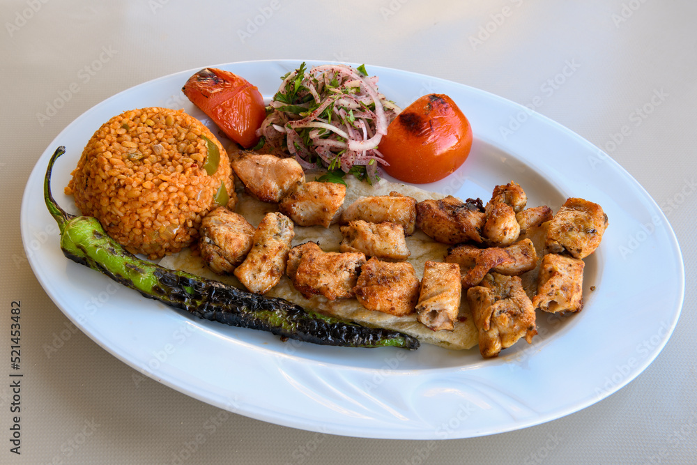 Chicken wings barbeque in a dish with BBQ grill sauce . Izgara tavuk kelebek sis kanat. Tavuk sis, gogus. Chicken wings barbeque in a dish with BBQ grill sauce . Izgara tavuk kelebek sis kanat. Tavuk sis, gogus.