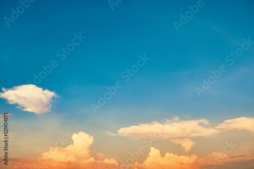 Sunset sky with clouds on blue sky at sunset © Pavlo Vakhrushev