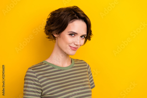Closeup photo of young attractive lady smiling look directly you want some fun isolated on yellow color background © deagreez