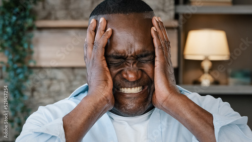 Portrait of annoyed african american adult man angry furious senior elder businessman shouts NO covers ears with hands much noise feels panic attack mad furious about loud music disturbing noisy sound