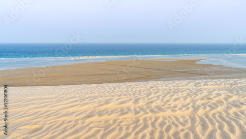 qatar adventurous place khor al udeid ,sea line beach during sunset.