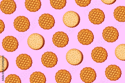 Cookies, creative food pattern on pastel pink background. Flat lay.