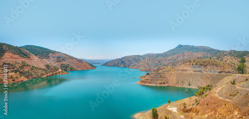 Panoramic view of Bağbaşı Dam and lake on a sunny day - Konya, Turkey © muratart
