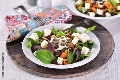 Salad with sweet potatoes and beluga lentils  photo