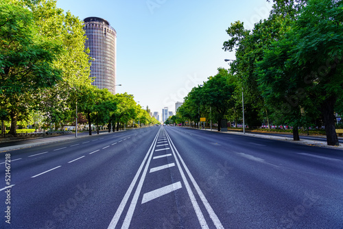 Great avenue of the Paseo de la Castellana  in the city of Madrid  with little traffic on a public holiday.