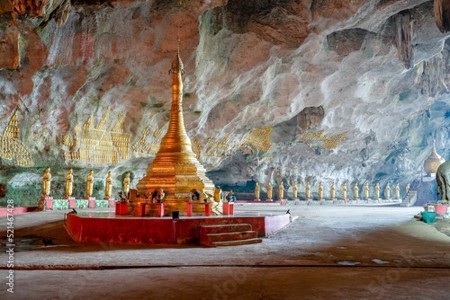 Beautiful view of the Buddha statue inside Kaw Ka Thaung Cave, in Hpa An, Myanmar