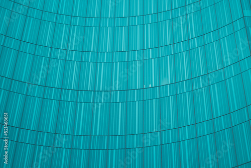 underside panoramic and perspective view to steel blue glass high rise building skyscrapers