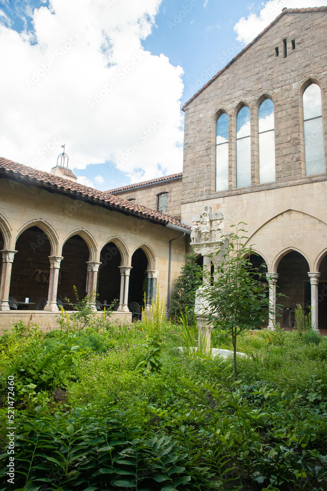 Exterior View of the Met Cloisters in Washington Height Manhattan with architectural details and garden