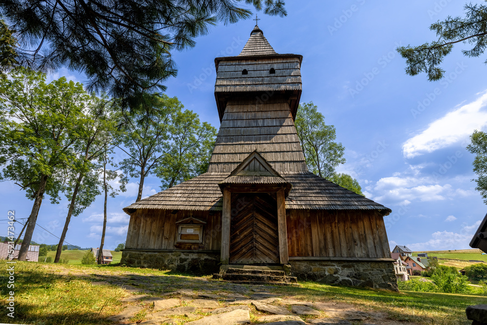 Old orthodox church surrounded by the trees on the hill at clear day. Old orthodox church surrounded by the trees on the hill at clear day.